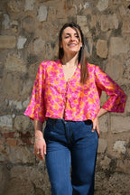 Top con fiocchetti